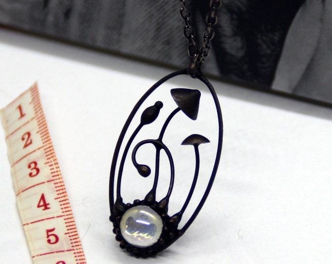 Psychedelic mushrooms handmade small oval metal pendant with clear glass, witch fairy style clothing, boho hippie fungus jewelry.