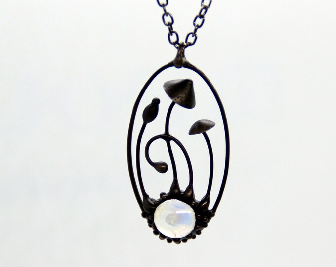 Psychedelic mushrooms handmade small oval metal pendant with clear glass, witch fairy style clothing, boho hippie fungus jewelry.