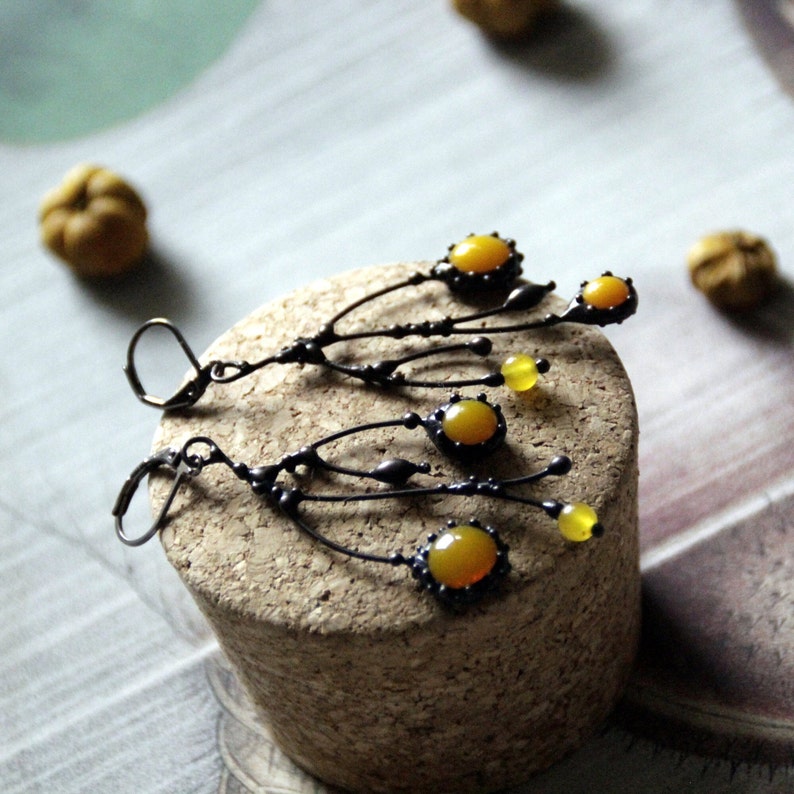 Unusual boho hippie asymmetric forest tree branch earrings with yellow stained glass. Size about 6/3 cm (2.36*1.18 in). Color: black/yellow.