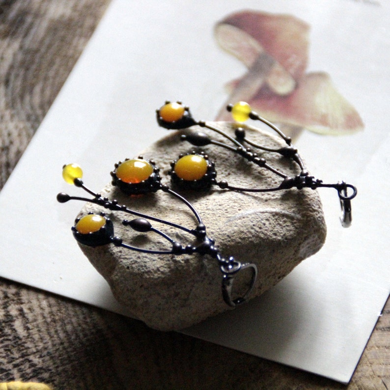 Unusual boho hippie asymmetric forest tree branch earrings with yellow stained glass. Size about 6/3 cm (2.36*1.18 in). Color: black/yellow.