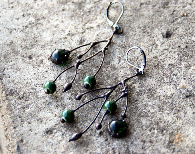 Asymmetrical forest earrings with green ceramic inlays and green glass, tree branch earrings, aymmetrical jewelry.