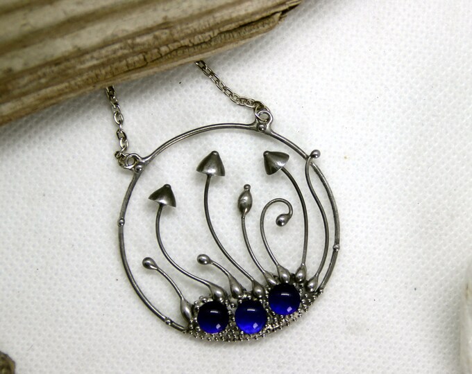 Psychedelic fungi boho hoop pendant necklace with blue glass, unique woodland forest gift jewelry, goblincore unusual statement jewelry.