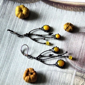 Unusual boho hippie asymmetric forest tree branch earrings with yellow stained glass. Size about 6/3 cm (2.36*1.18 in). Color: black/yellow.