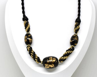 Vintage necklace black glass beads painting flowers gold color on cord chain fabric massive 80s