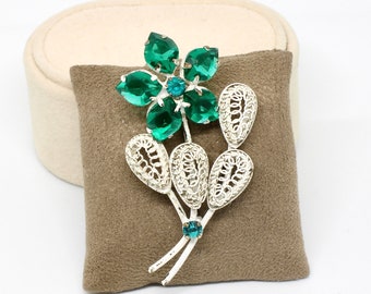 Vintage Brosche Anstecknadel Blume weiß glasiert grüne Glassteine Austria Damenbrosche