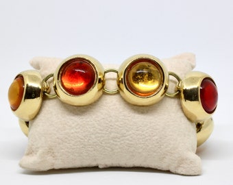 Yves Saint Laurent YSL bracelet gold color red orange artificial stones Haute Couture France collectible 50s