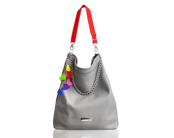 Leather shoulder bag with colorfull pendant