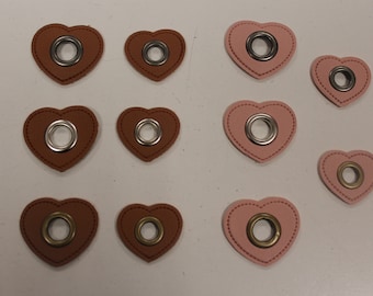 2 eyelets with patch, different sizes and eyelet colors, heart