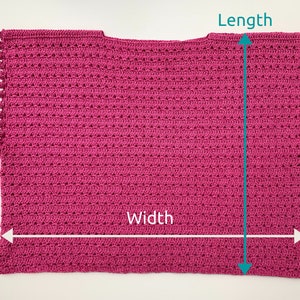 May include: A pink crocheted top with a scalloped edge and a length of approximately 18 inches and a width of approximately 20 inches.