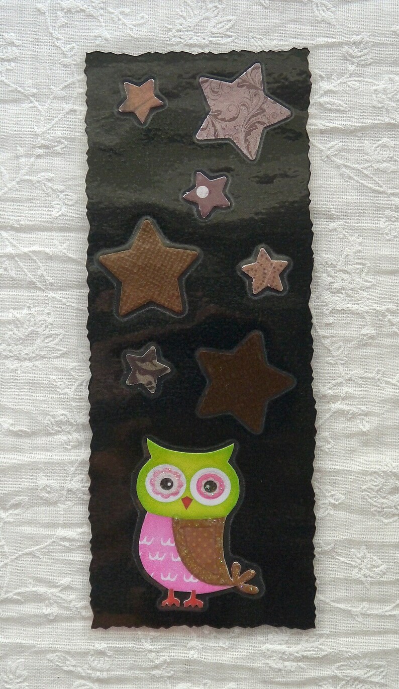 Black bookmark with brown stars and owl image 1