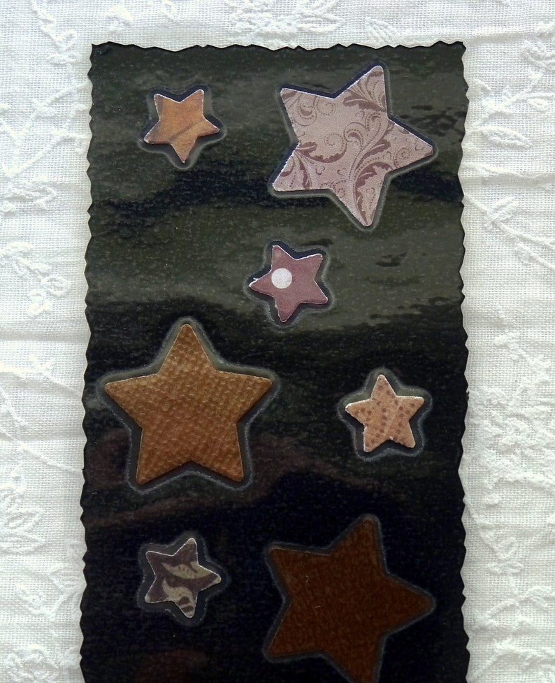 Black bookmark with brown stars and owl image 2