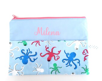 Toiletry bag, diaper bag, travel first aid kit can be personalized