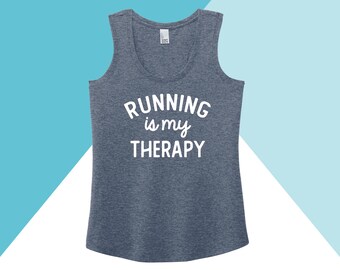May include: A heather gray tank top with the text "RUNNING is my THERAPY" in white.