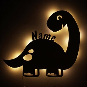 Dino Geschenke Lampe Schlummerlicht Nachtlicht personalisiert mit Namen I Holz Kinder Geschenk für Dinosaurier Fans I Batteriebetrieben zdjęcie 1