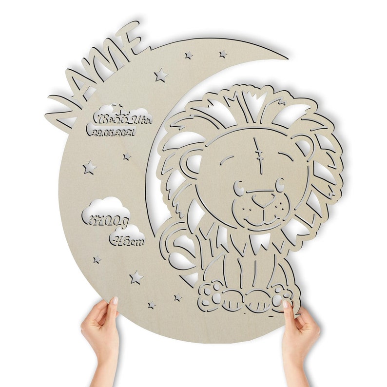 May include: A wooden cutout of a crescent moon with stars and a lion. The moon has the text "NAME" at the top, "23:52:21am 29.05.2021" in the middle, and "5200g 46cm" at the bottom.