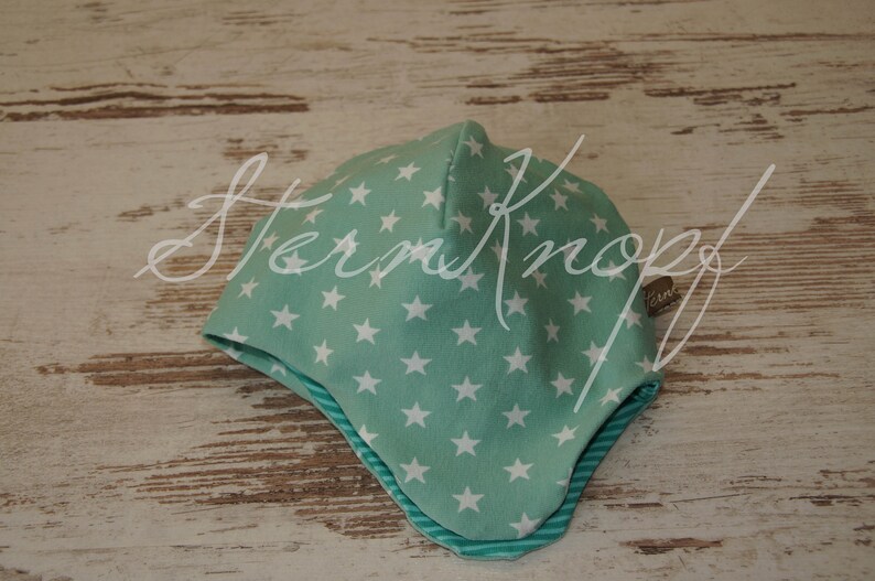 Aviator hat /' asterisk /' turning cap with ear protection