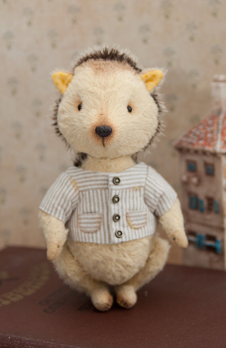 hedgehog with teddy bear