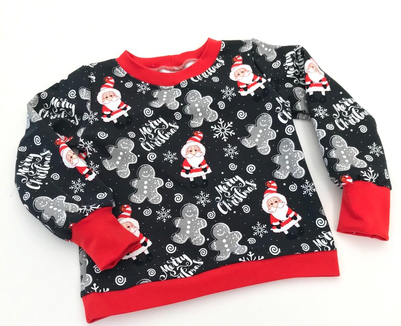Sweatshirt Pullover Shirt Baby Kind 62-110 Weihnachtspullover Lebkuchen schwarz