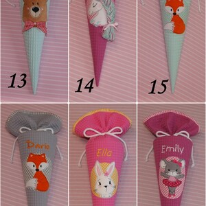 May include: Six cone-shaped fabric gift bags with drawstring closures, each featuring a unique embroidered animal character and a personalized name. The designs include a bear, unicorn, fox, rabbit, and mouse, rendered in various colors and textures.