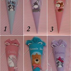 May include: Six cone-shaped fabric gift bags with waffle texture, each featuring a drawstring top, embroidered names, and animal or mythical creature appliqu&eacute;s. The designs include a raccoon, donkey, deer, unicorn, bear, and another raccoon in various colors.