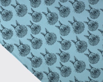 Printed jersey fabric with rabbits in light blue