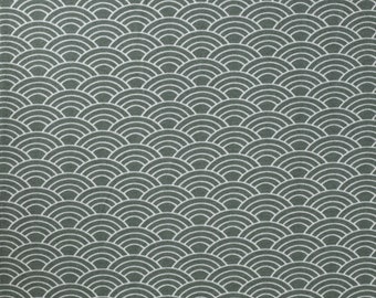 Printed jersey fabric with geo pattern fir green