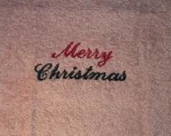 Salmon soaptowel with red green inscription "Merry Christmas"