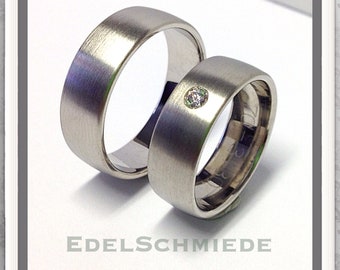 Wedding rings as a classic in 375 white gold matt + diamond 0,05ct