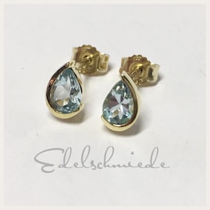 dezente Ohrstecker 333/- Gold mit Blautopas (beh.)