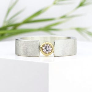 Silver ring with morganite, 18k gold setting