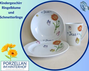 Porzellanset leuchtende Ringelblume und Schmetterlinge mit Namen personalisiert. Schön als Kindergeschirr aber auch Geschenkidee für Große