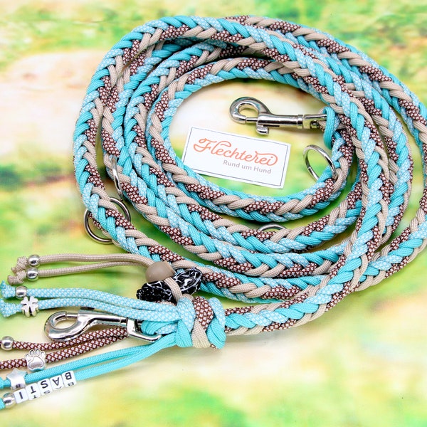 Hand-braided paracord dog leash in turquoise-beige for medium to large dogs. With dog bag dispenser. Personalizable.