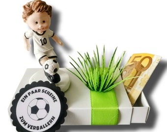 Money gift box footballer