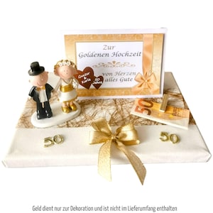Geld Geschenk zur goldenen Hochzeit mit Goldpaar und Glückwunschkarte