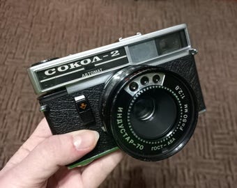 1970年代のヴィンテージ Petri FT 35 mm フィルムカメラ（革製ケース