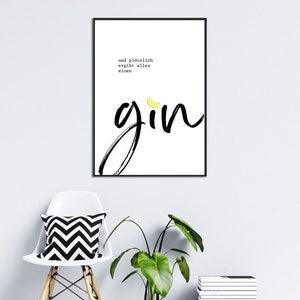May include: A black and white printable wall art print with the word "gin" in a bold, handwritten font. A small lemon wedge is placed above the word "gin". The text "und pl&ouml;tzlich ergibt alles einen" is written in black above the word "gin".