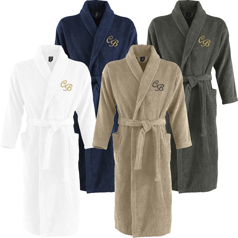 May include: Four bathrobes in different colors: white, navy blue, beige, and gray. Each robe has a  'CB' monogram embroidered on the left chest.