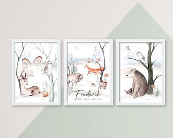 May include: Three watercolour illustrations in white frames depicting a woodland scene with a deer, a wolf, a fox, a bear, and owls. The middle frame includes the name "Frederik" and the date "02.02.2021" along with the birth weight and length.