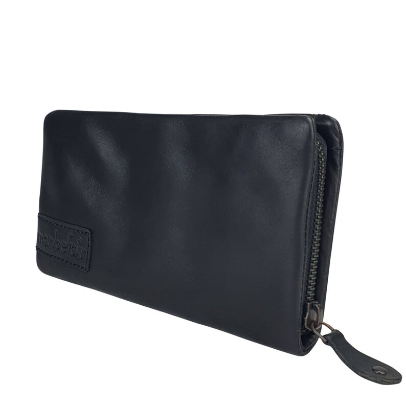 May include: A black leather zippered wallet with the word "hamburgefrit" embossed on the front.