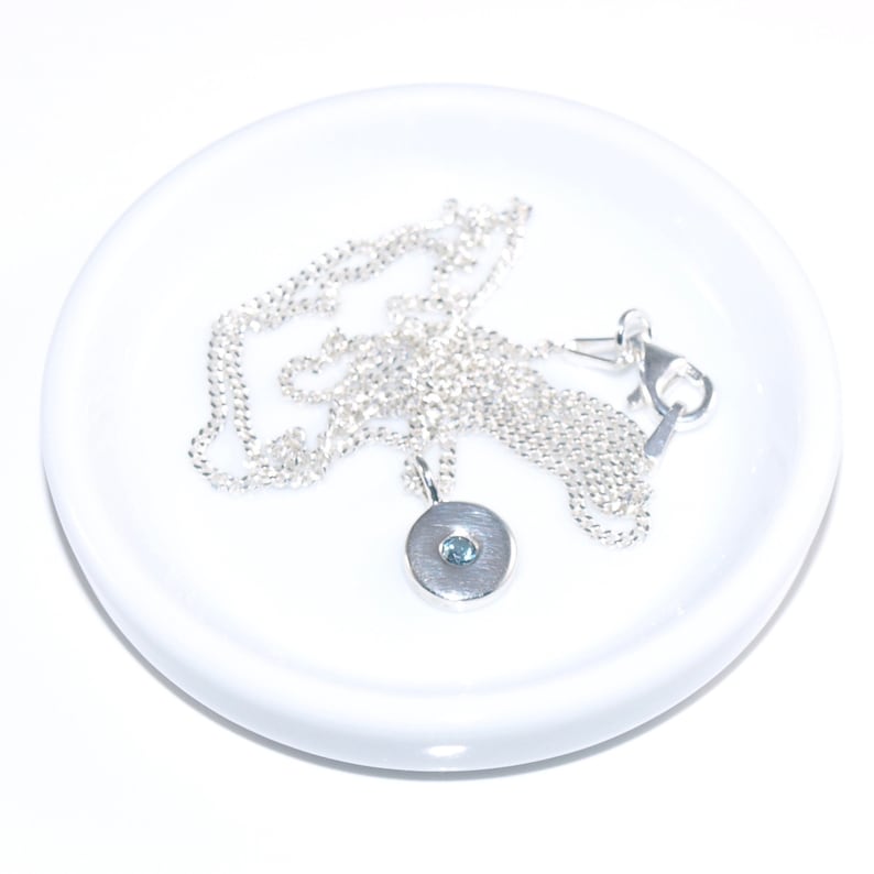 2.5mm diameter Topaz London with necklace Very British