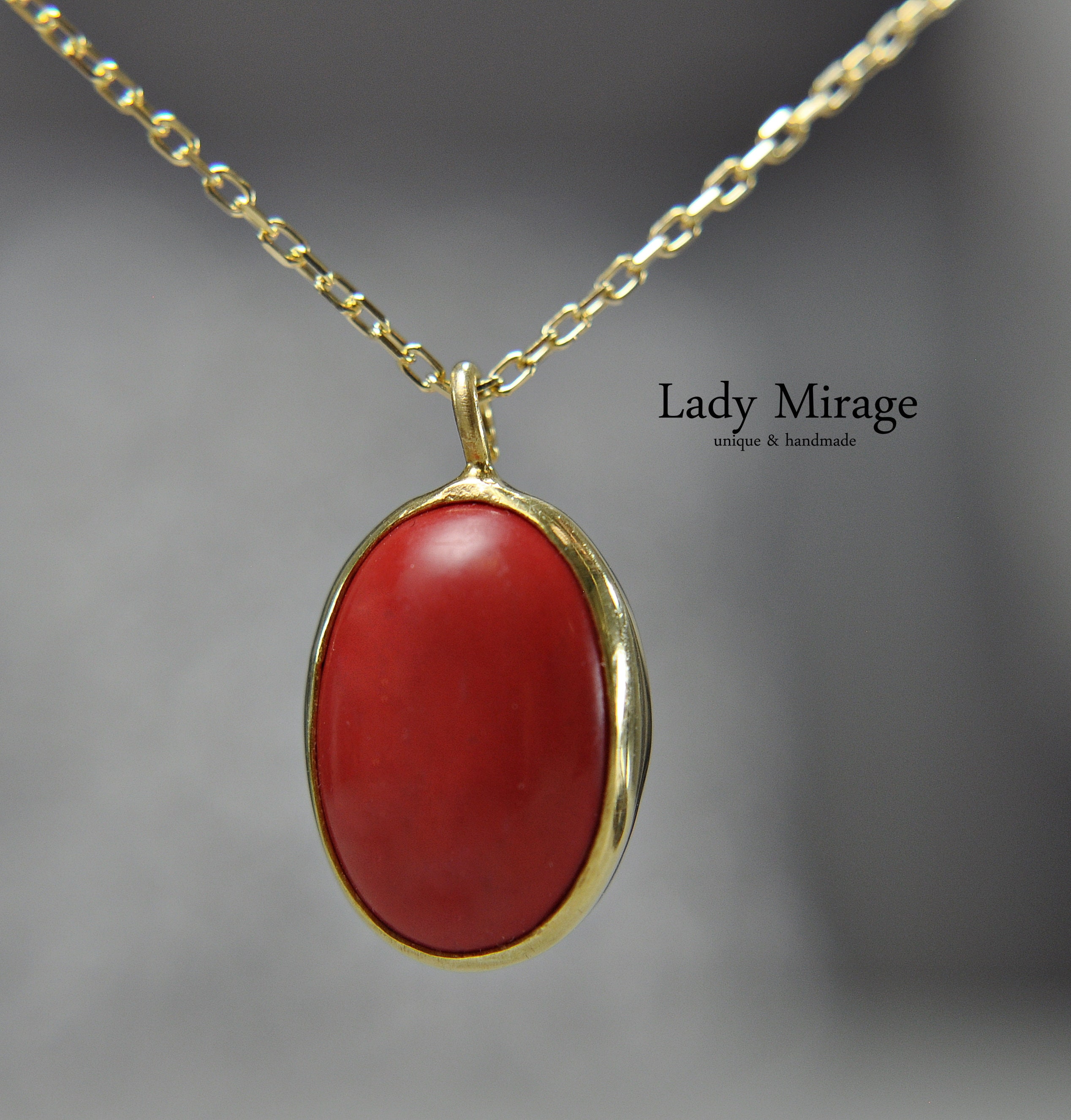 Gold coral best sale pendant
