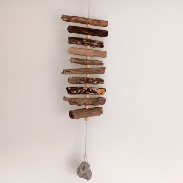 Driftwood necklace / wind chime / garland made of driftwood, shells, hole stones and cotton cord.