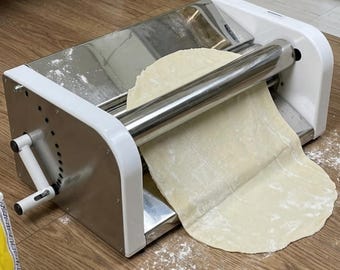 Pizza dough rolling machine / dough rolling machine for making various types of bread