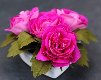 Roses made from doublette crepe paper in a ceramic heart