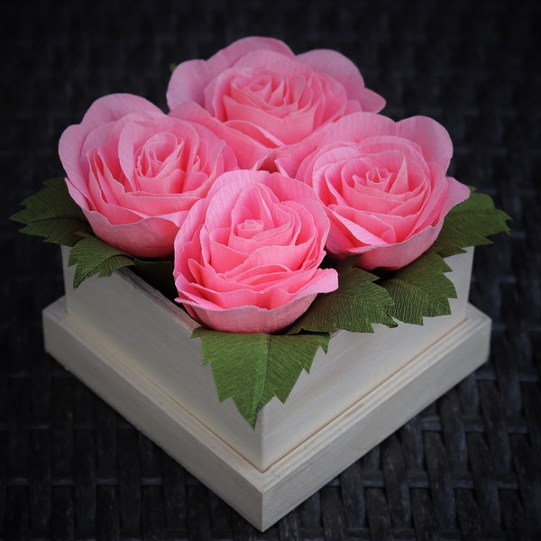 4 roses from doublette crepe paper in a wooden box