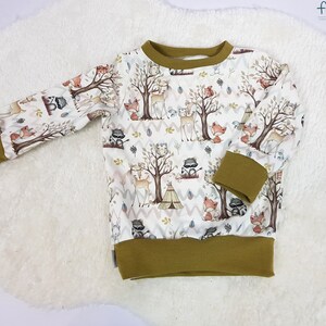 From 21.90 euros long-sleeved sweater pullover forest animals