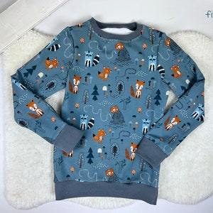 From 22.90 euros: Long-sleeved shirt, sweater, pullover, forest animals image 1