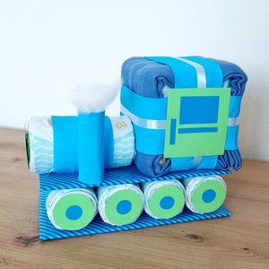 Windelzug. Junge, blau, grün, Eisenbahn, Windeltorte, Tasche, Zug, Windellok, diy, Windelrucksack, Taufe, Geburt, Schwangerschaft, Geschenk