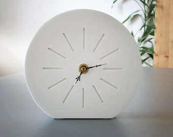 small design table clock with rays decoration, white