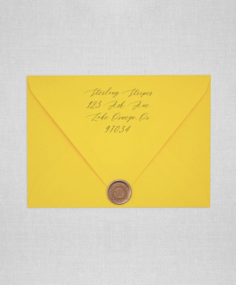 May include: A yellow envelope with a wax seal. The address is written in cursive: Sterling Stripes, 123 Ash Ave, Lake Oswego, OR 97034.